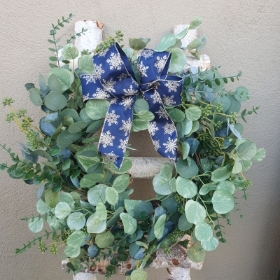 eucalyptus and white berry wreath with luxury navy ribbon