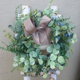 eucalyptus and white berry wreath with luxury ribbon