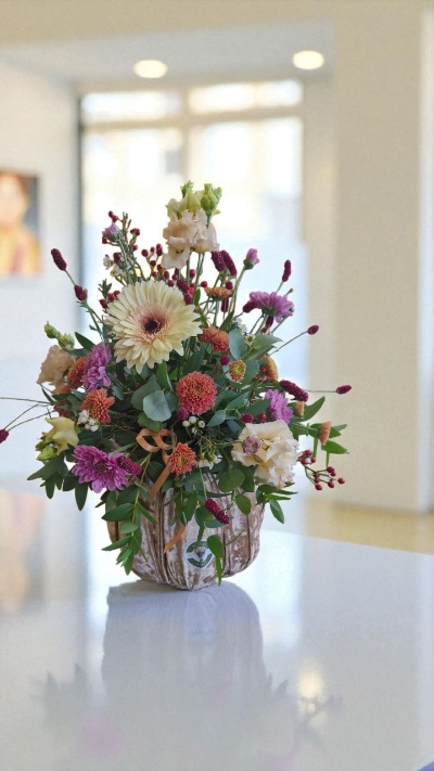 Champagne velvet pumpkin with fresh flower arrangement